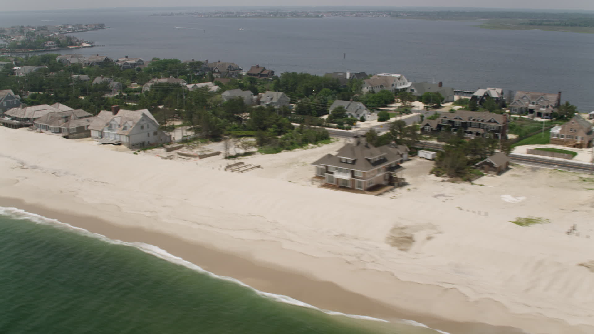 5K stock footage aerial video upscale beachfront homes at Mantoloking