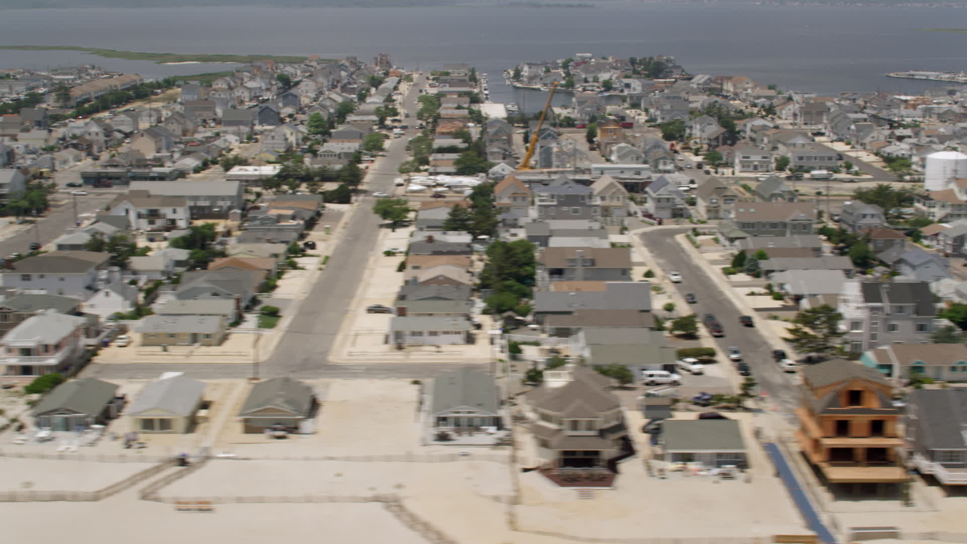 5K stock footage aerial video of beachfront homes in the coastal