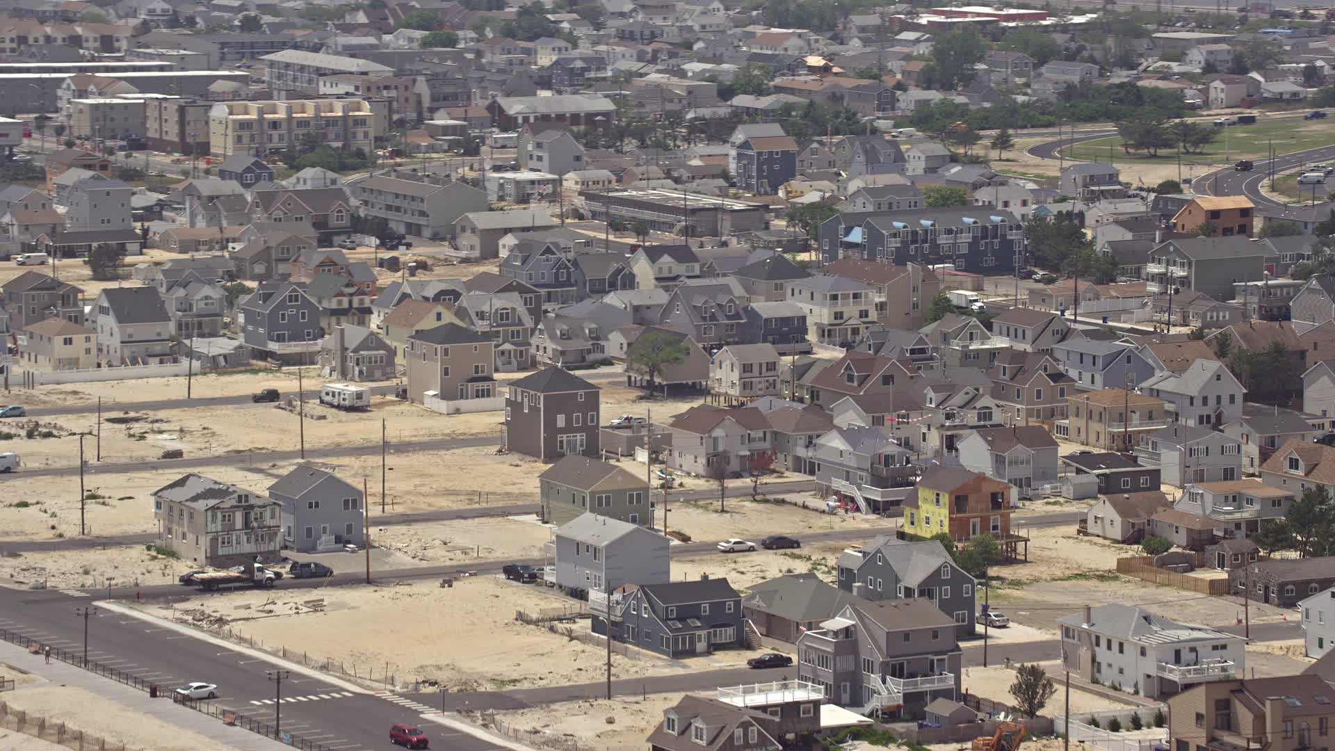 5K stock footage aerial video of homes near the beach in Seaside