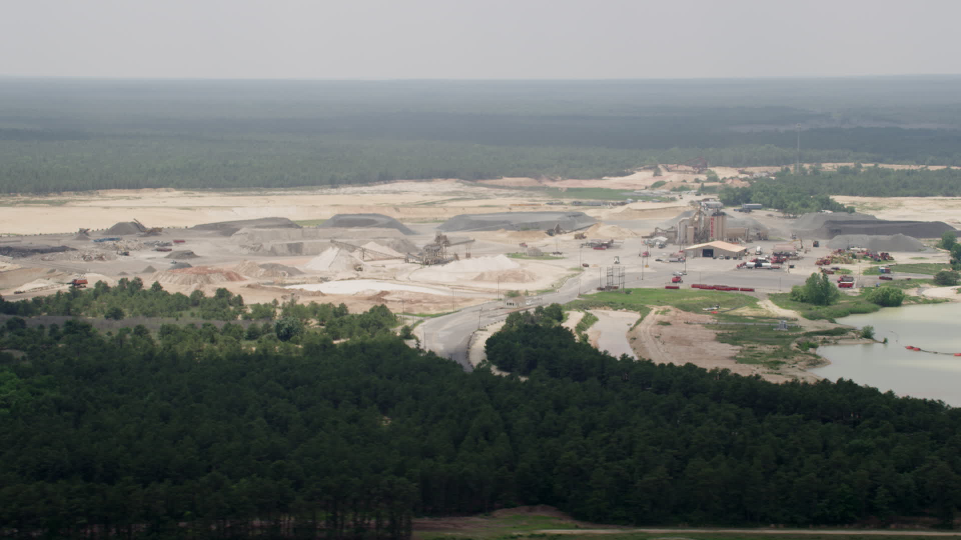 5K stock footage aerial video flying by a quarry in Forked River, New
