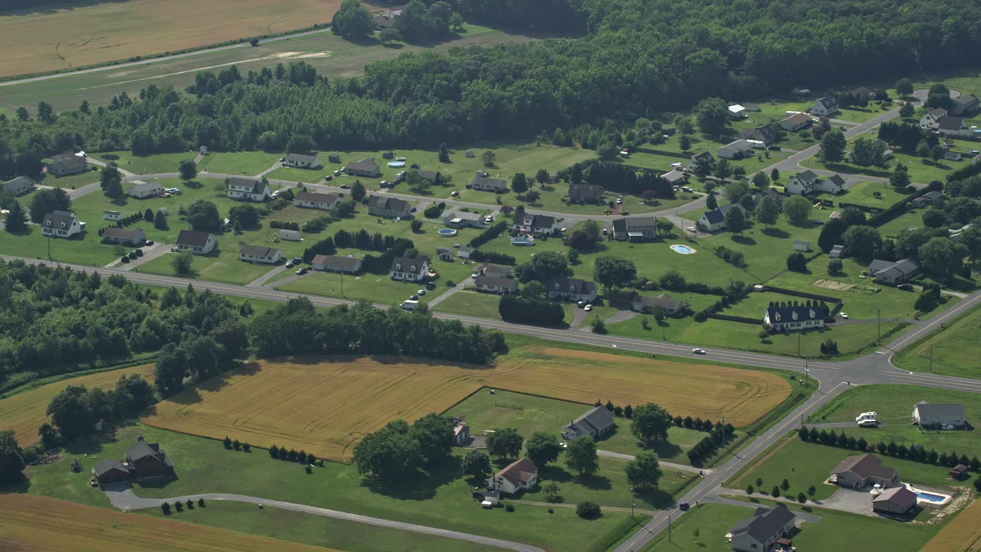 4.8K stock footage aerial video of rural neighborhood in Hartly