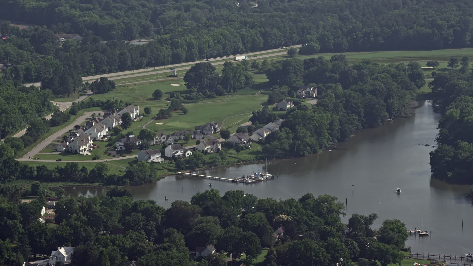 4.8K stock footage aerial video of riverfront homes by Little