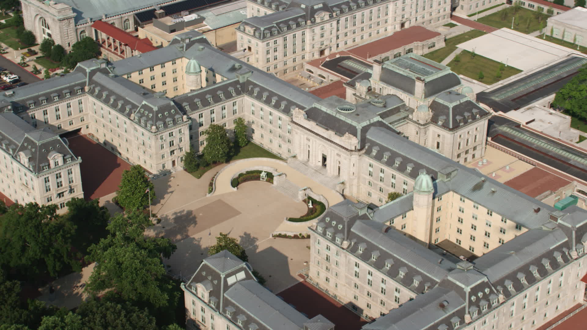 5K stock footage aerial video of Tecumseh Court and Bancroft Hall at the United States Naval