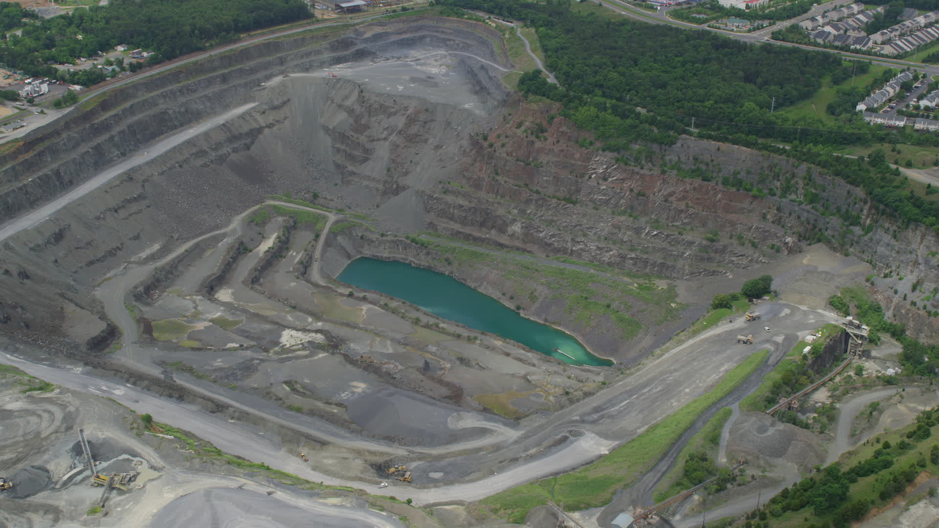 5K stock footage aerial video of Vulcan Lake in a quarry in Manassas