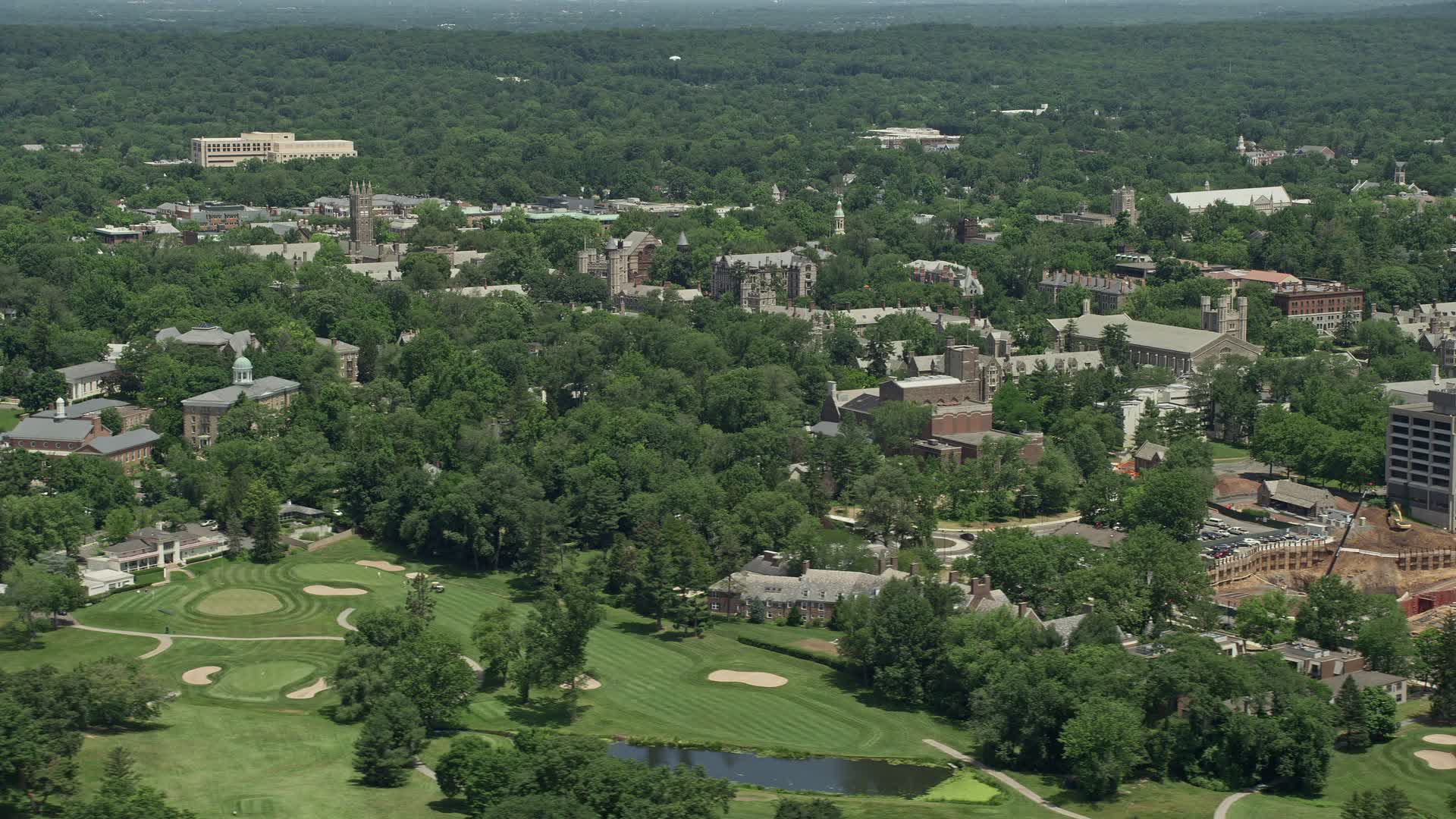 4.8K stock footage aerial video flying by the campus of Princeton