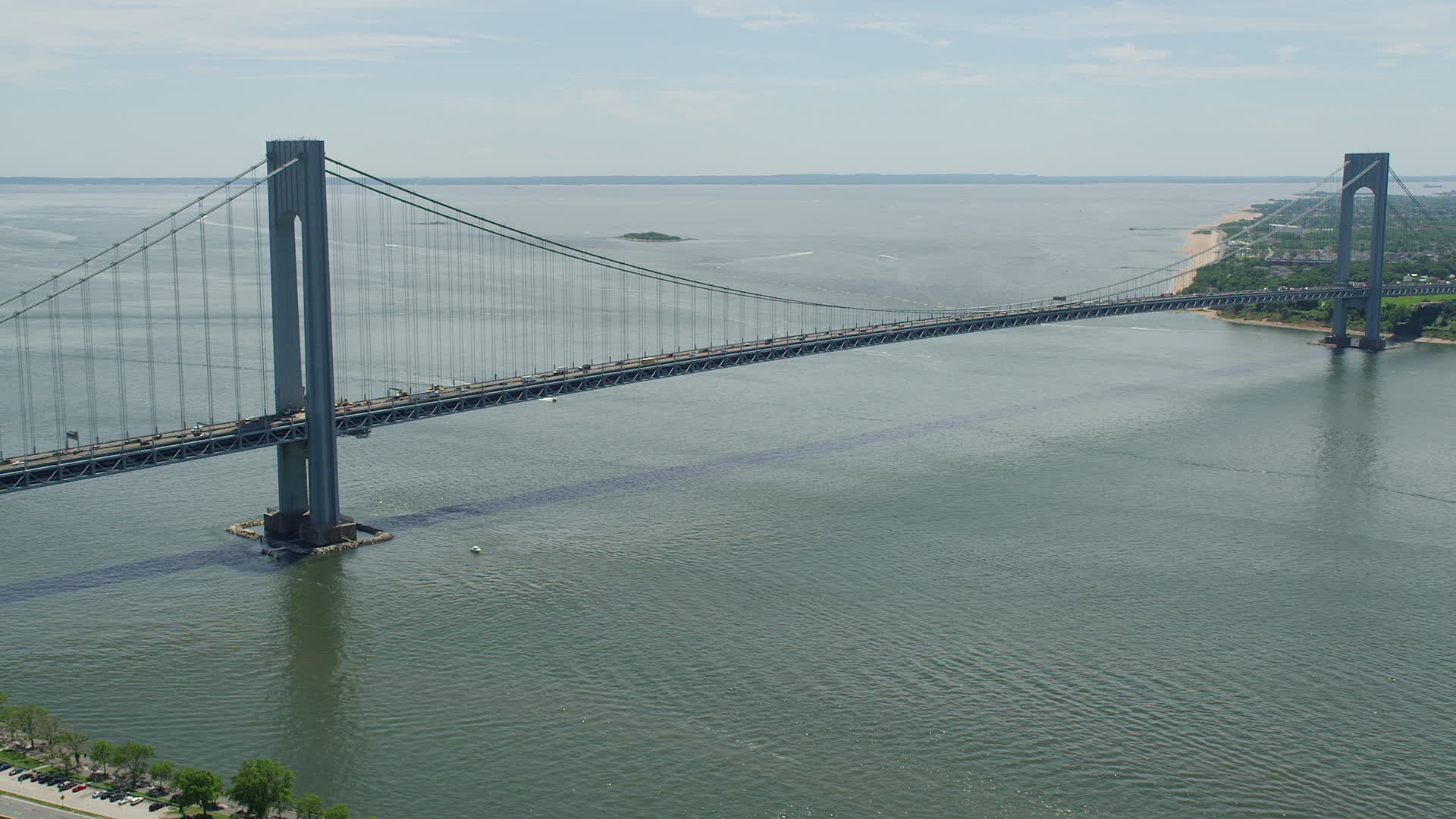 5K stock footage aerial video flying by the VerrazanoNarrows Bridge