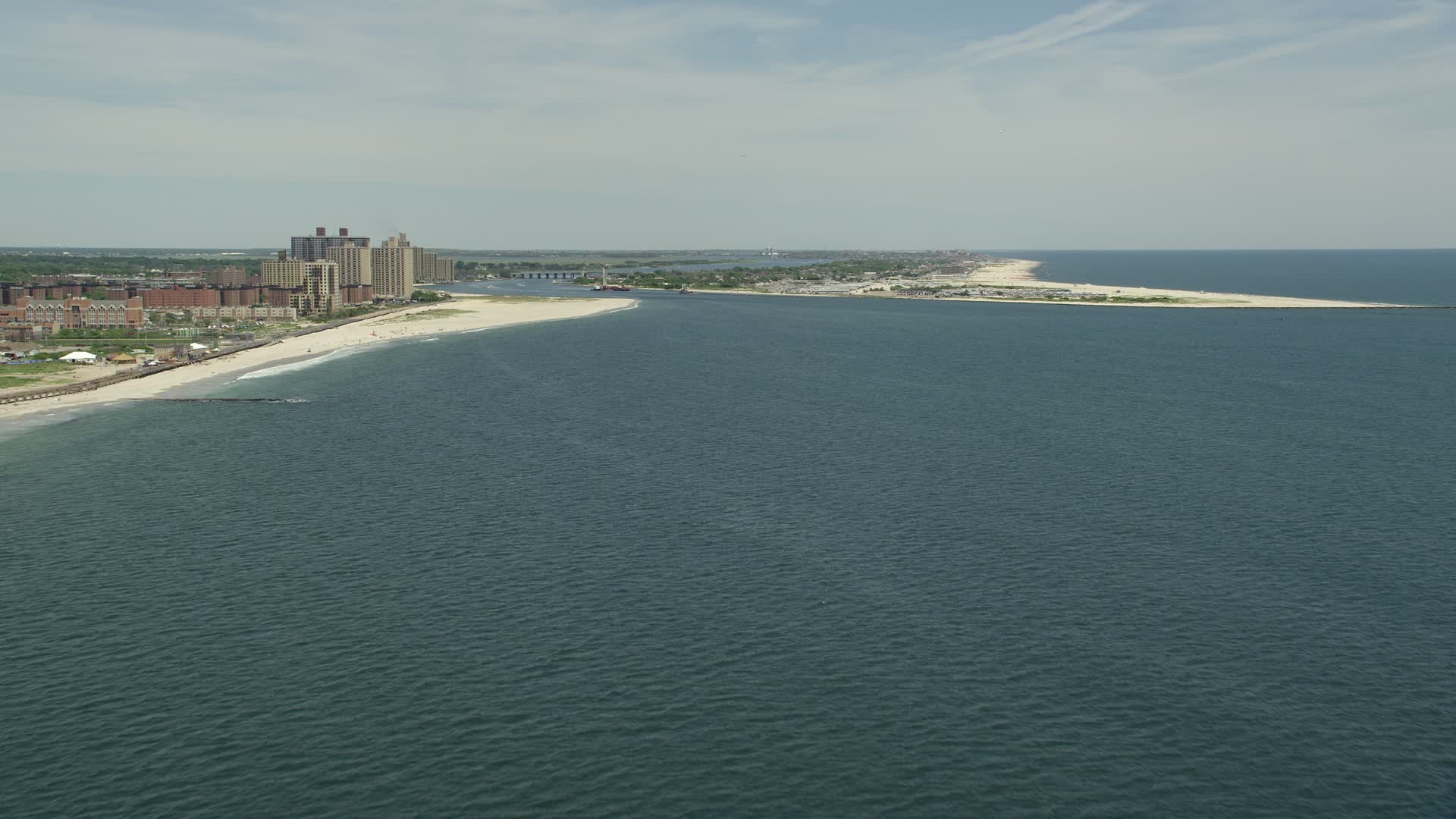 4.8K stock footage aerial video approaching beach, apartment complexes
