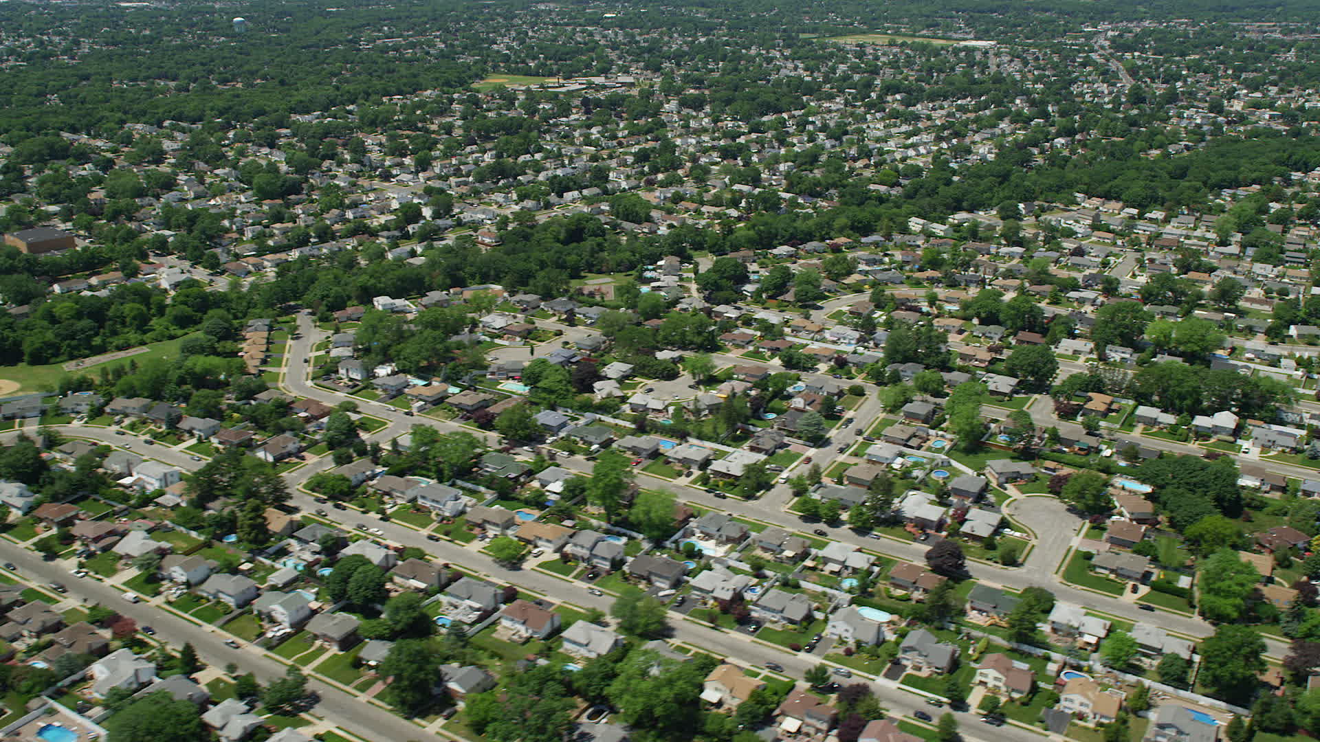 5K stock footage aerial video flying by Suburban Neighborhoods in