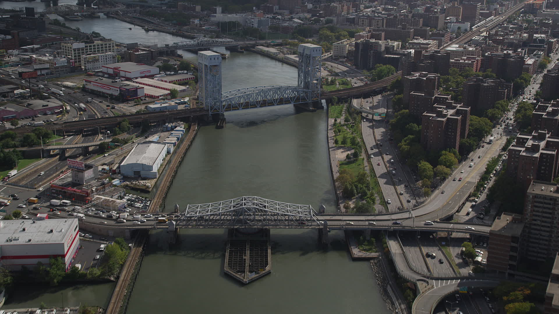 4K stock footage aerial video Fly over Harlem River, reveal Madison