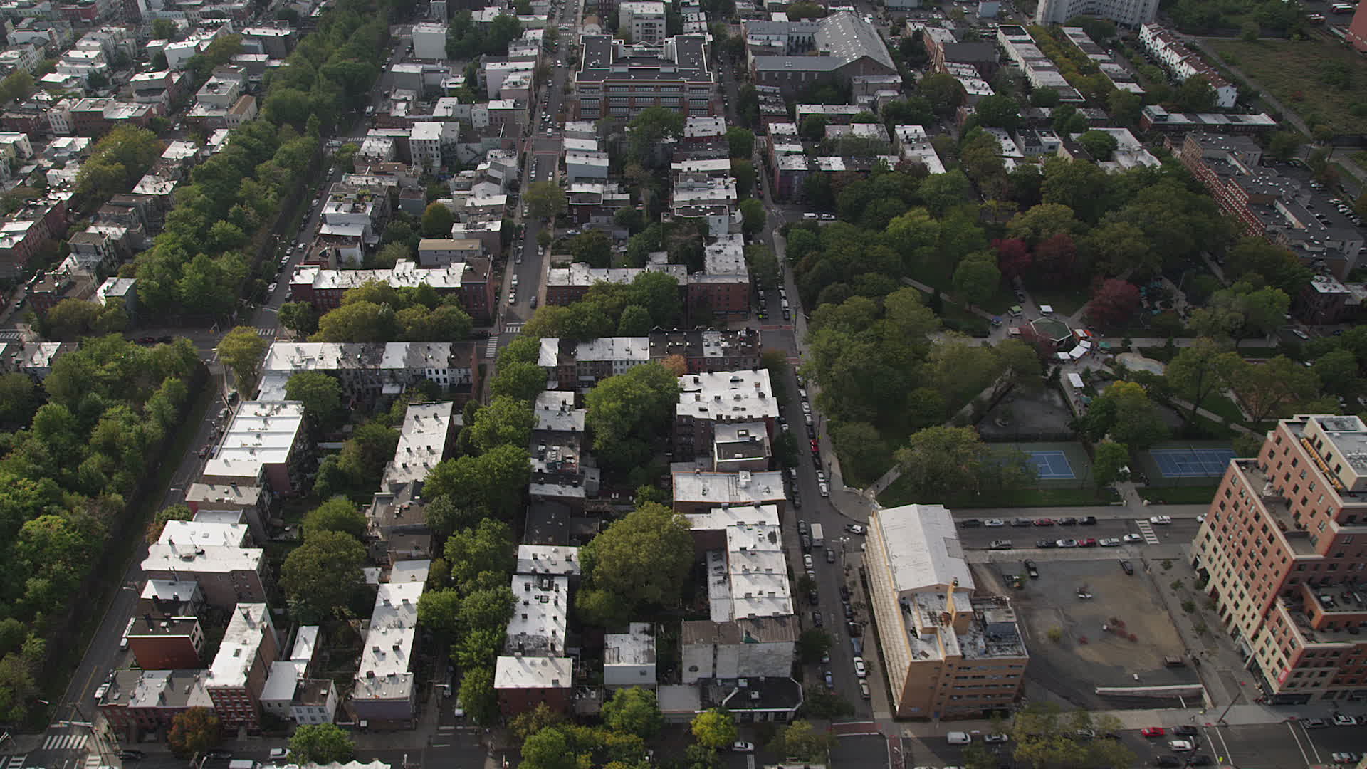 4K stock footage aerial video of flying over row houses by Hamilton Park, Jersey City, New