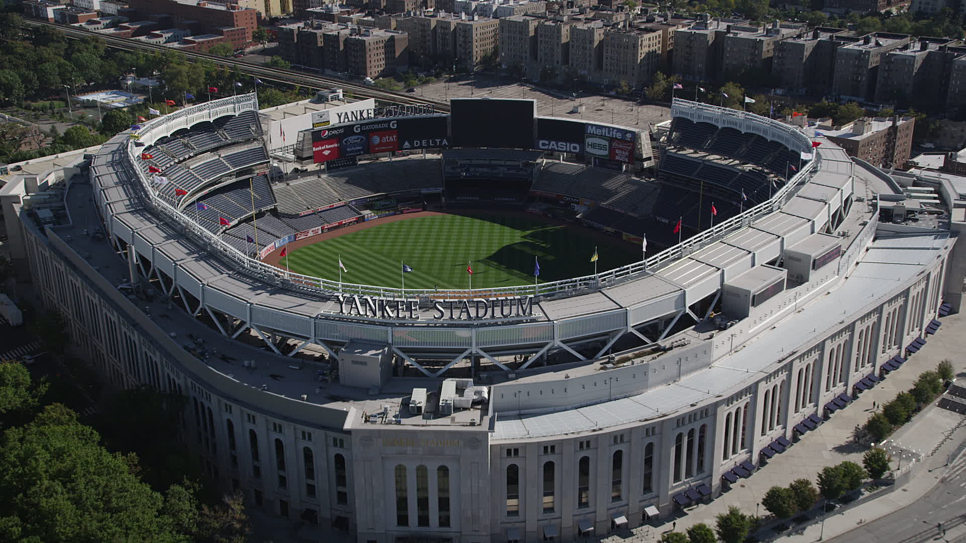 4K stock footage aerial video of approaching Yankee Stadium, tilting to