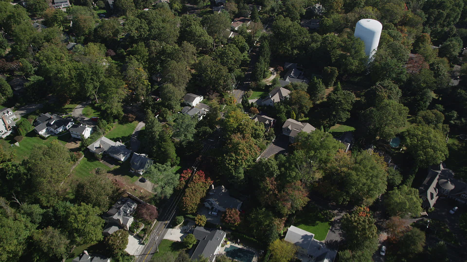 4K stock footage aerial video of tilting to suburban homes and