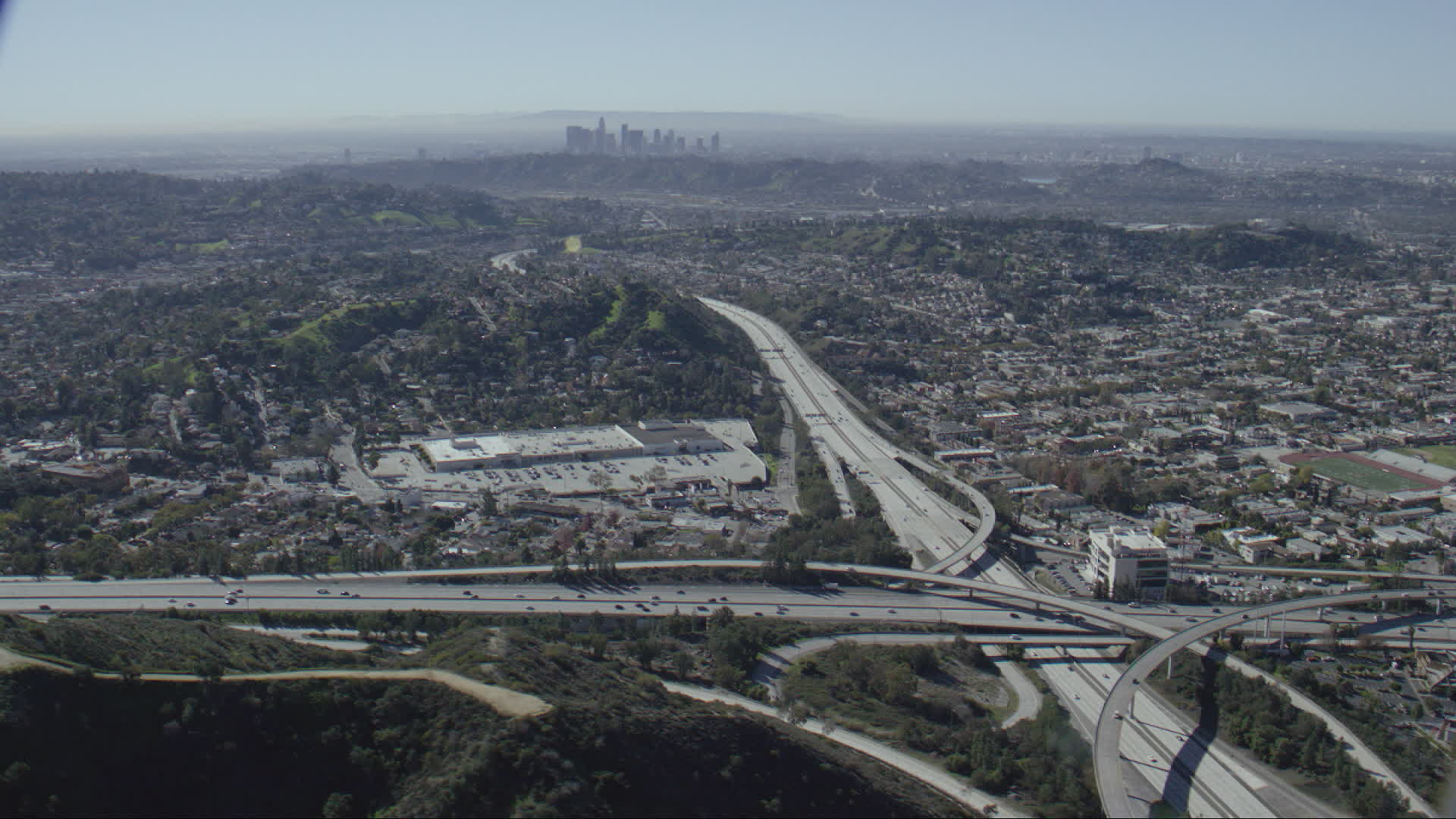 HD stock footage aerial video of the 2 and 134 freeway interchange in Glendale, California