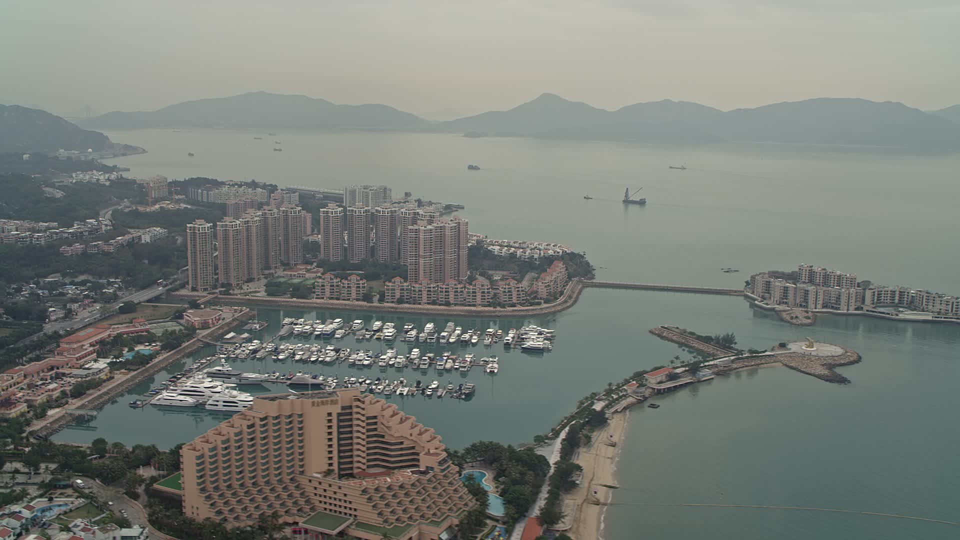 4K stock footage aerial video flyby Hong Kong Gold Coast Hotel, marina