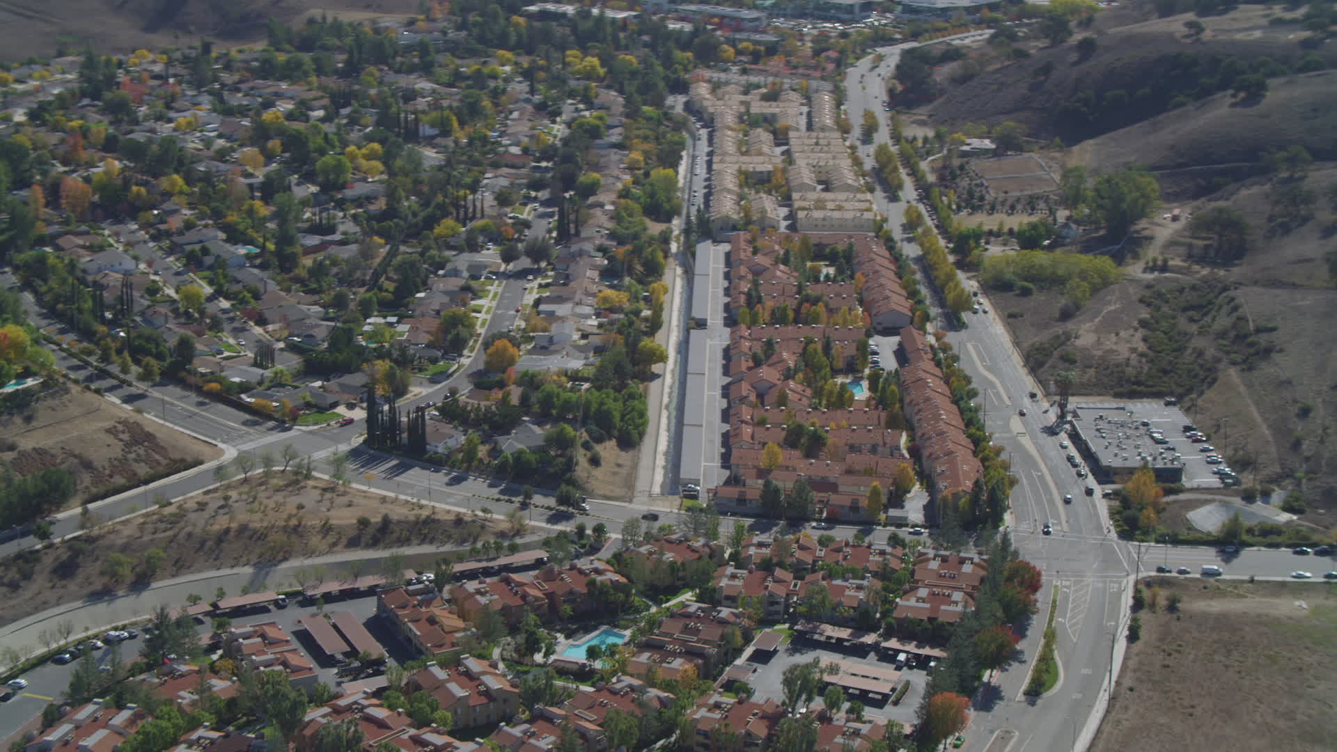 4K stock footage aerial video pan across neighborhoods, reveal