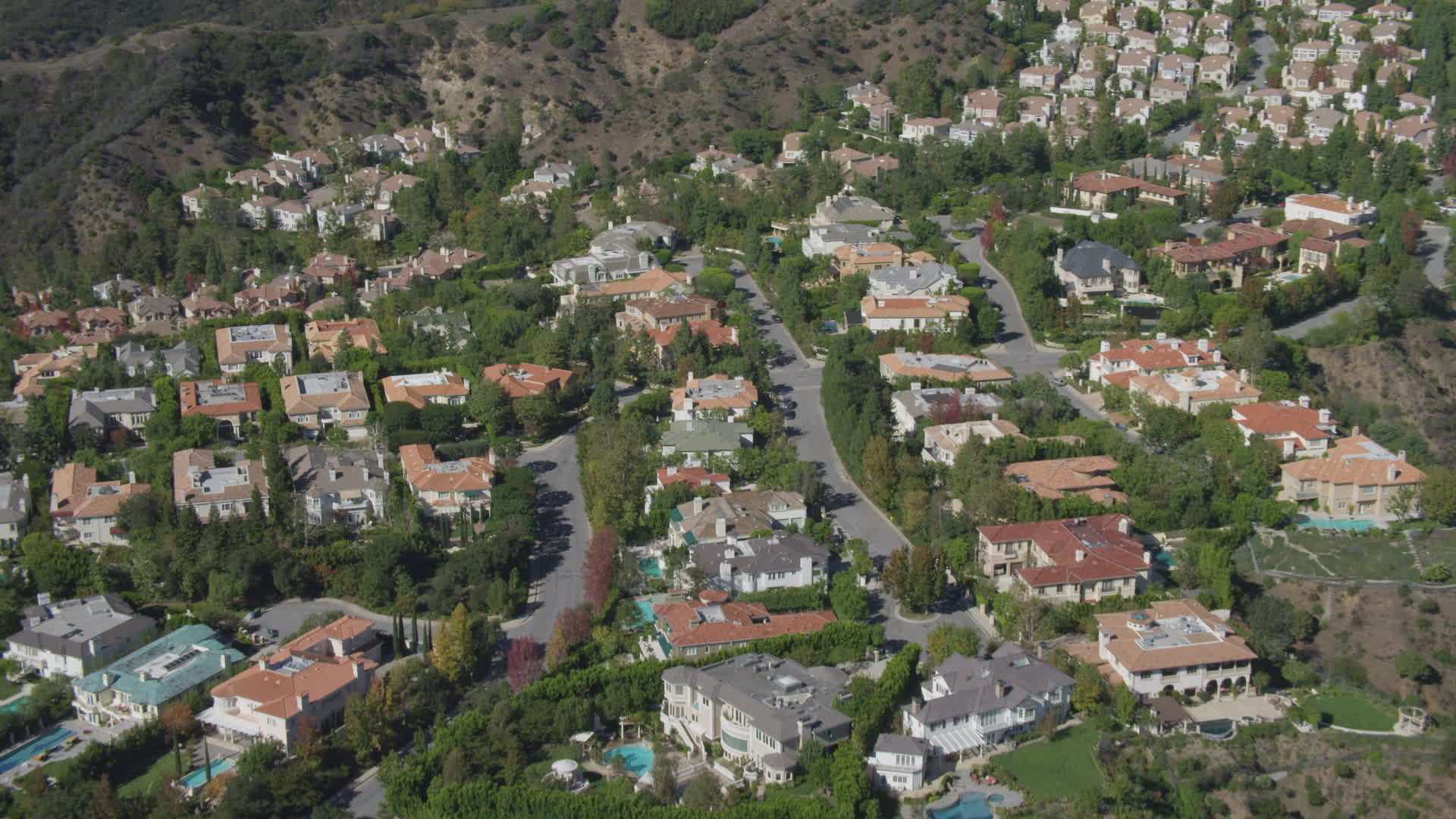 4K stock footage aerial video of approach and orbit mansions in Bel Air