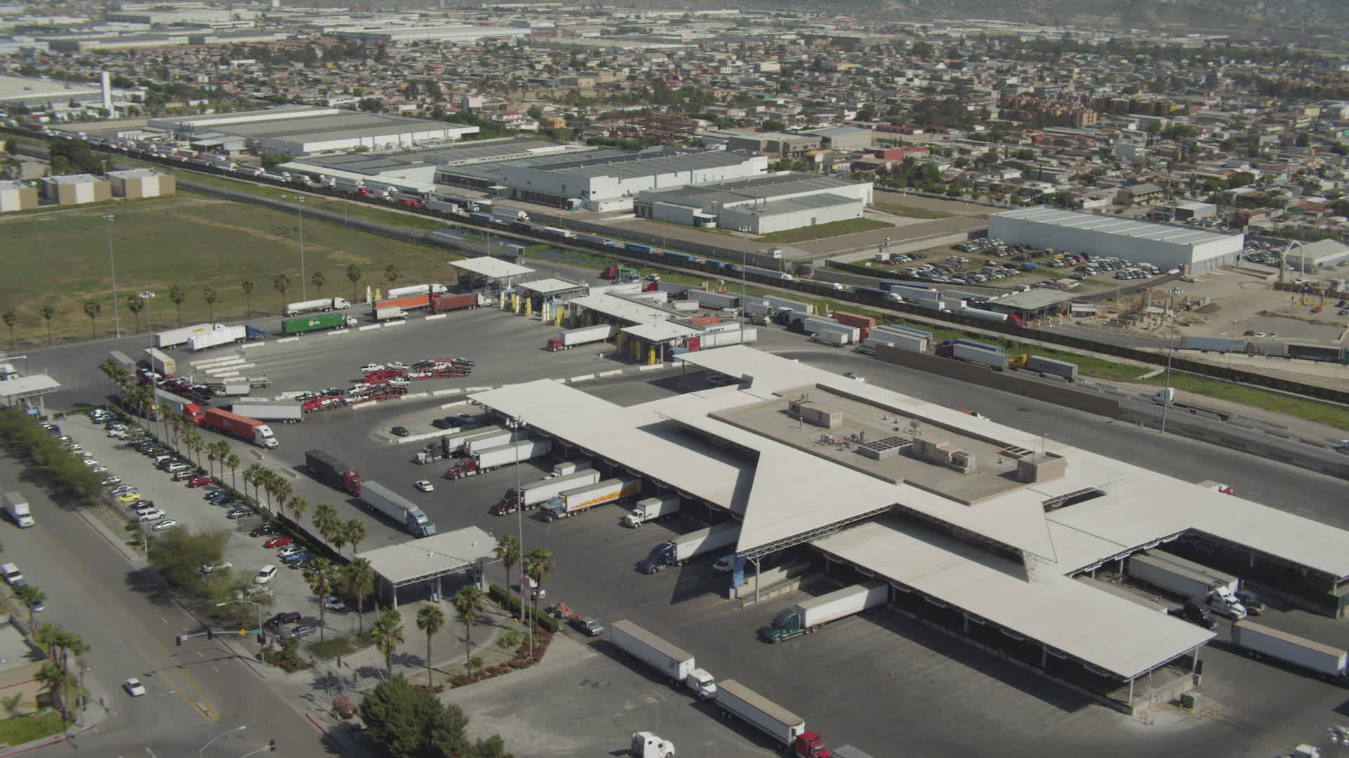 4K stock footage aerial video orbit Otay Mesa Port of Entry on the US