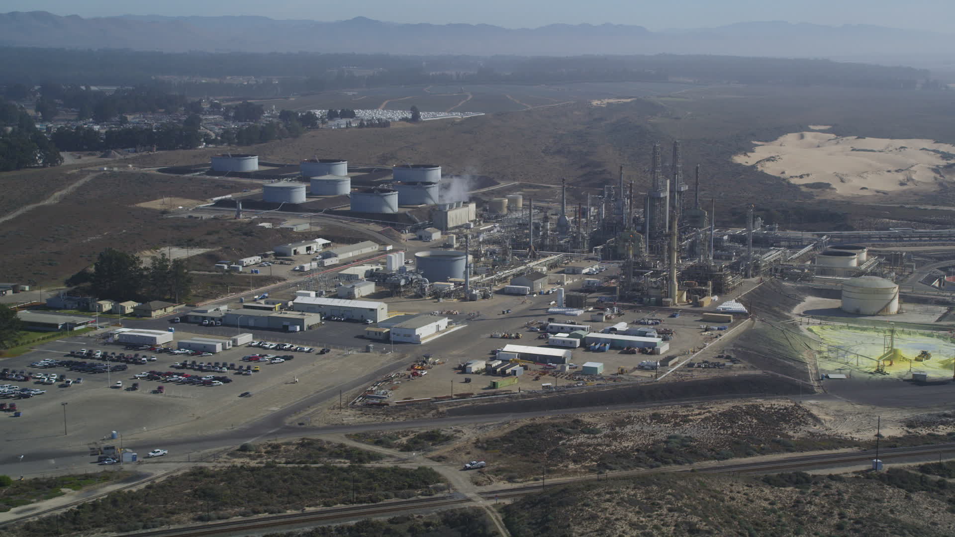 5K stock footage aerial video Approach Phillips 66 Company Santa Maria