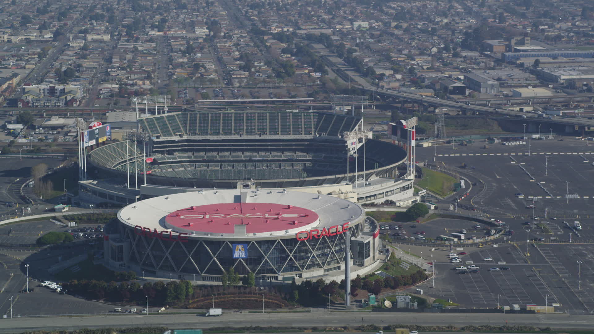 5K stock footage aerial video Flying by Oracle Arena and O.co Coliseum