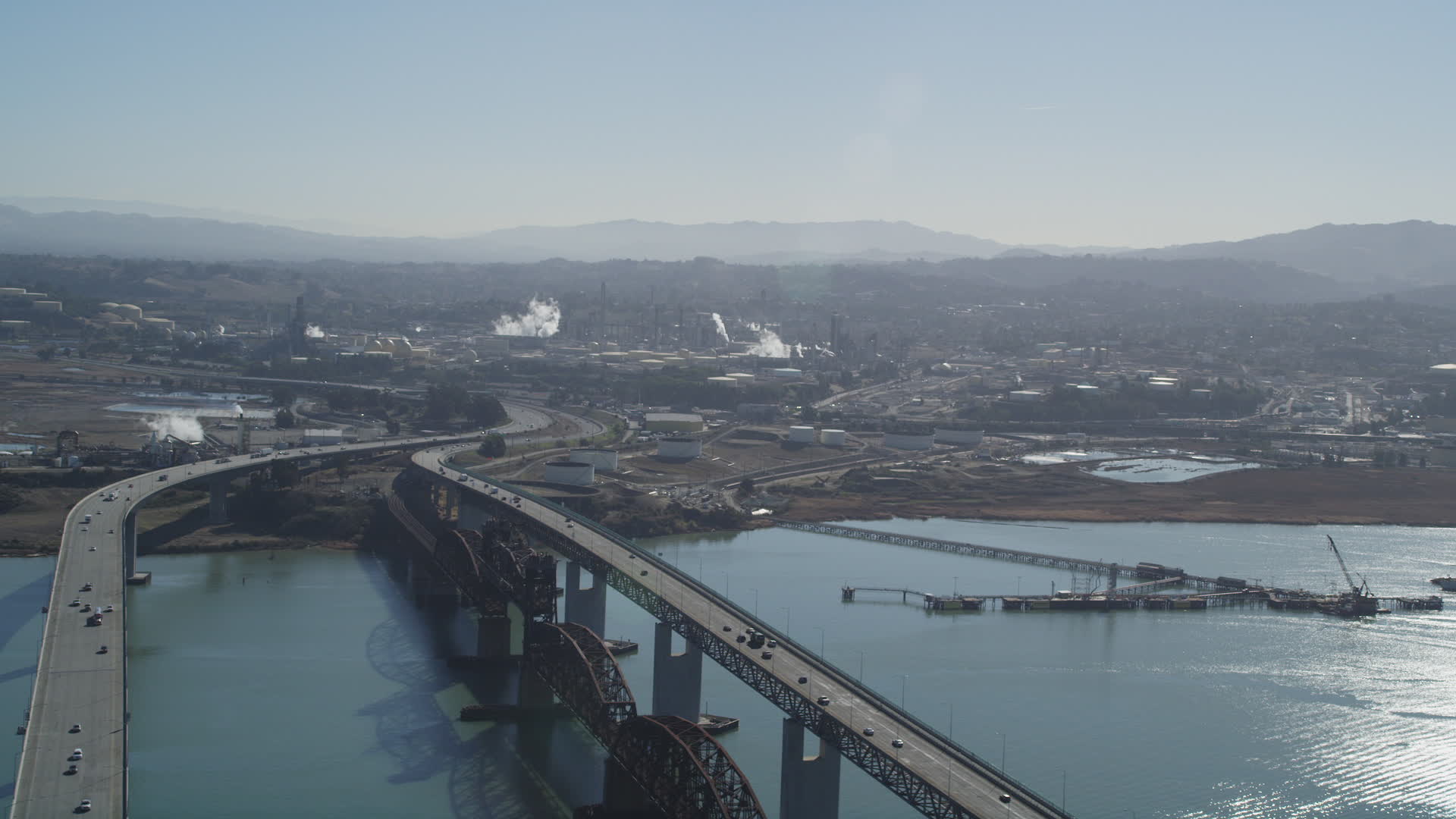 5K stock footage aerial video of flying by BeniciaMartinez Bridge near