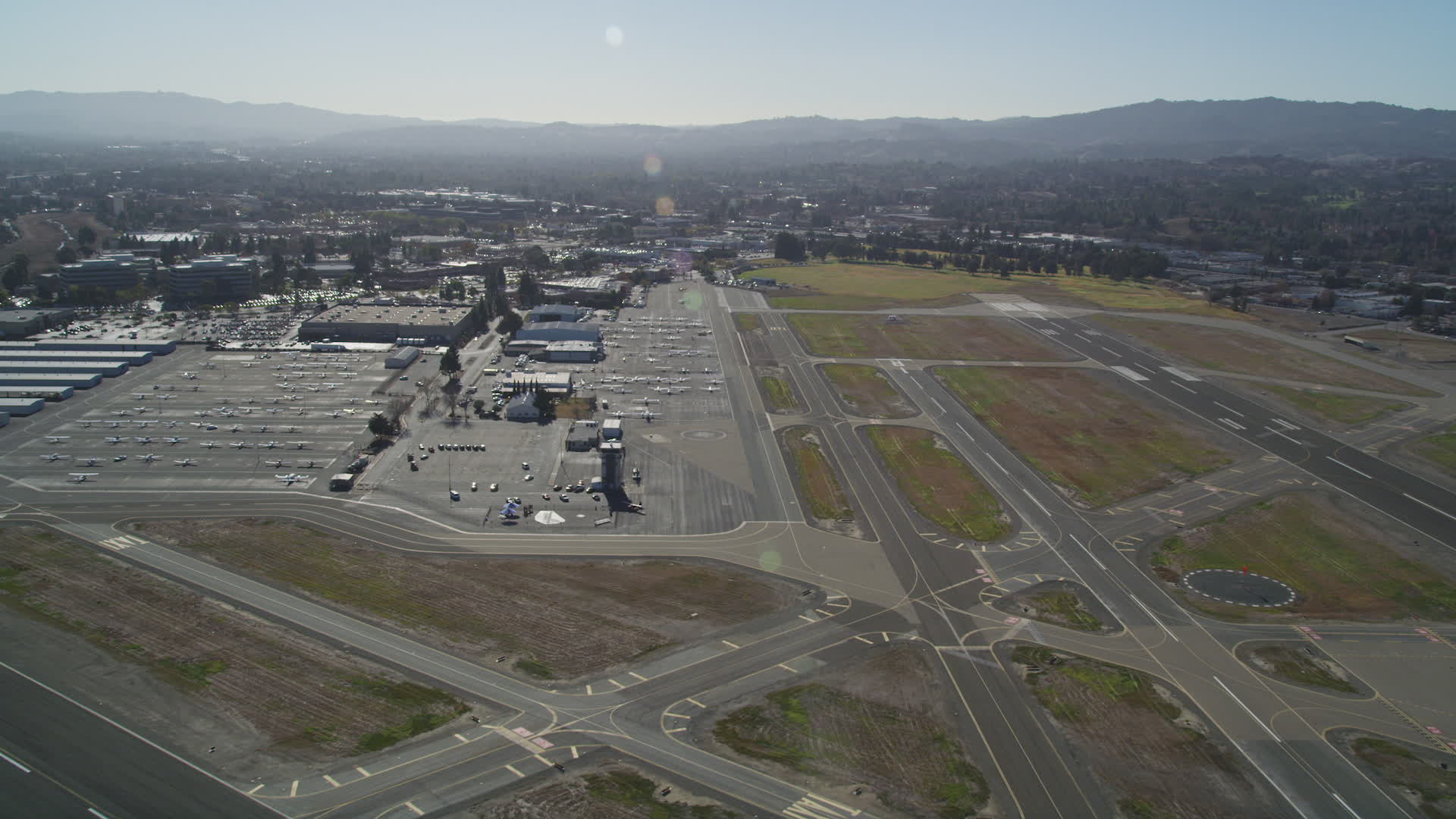 5K aerial stock footage video approach parked airplanes at Buchanan