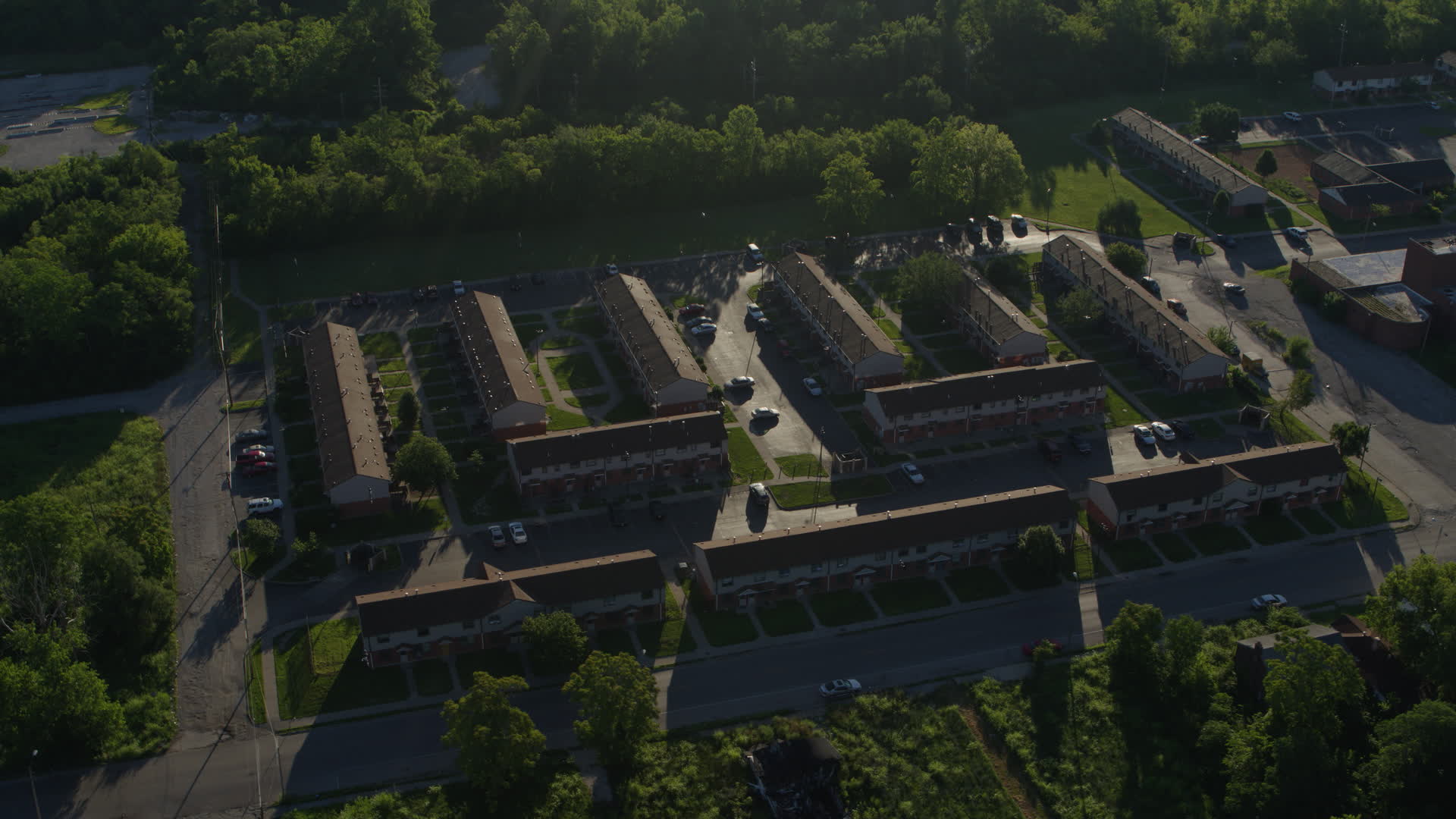 5.7K stock footage aerial video of low apartment buildings