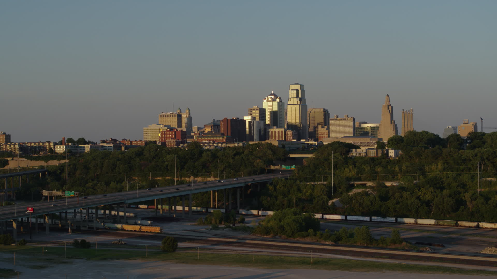 5.7K stock footage aerial video of the skyline at sunset in Downtown