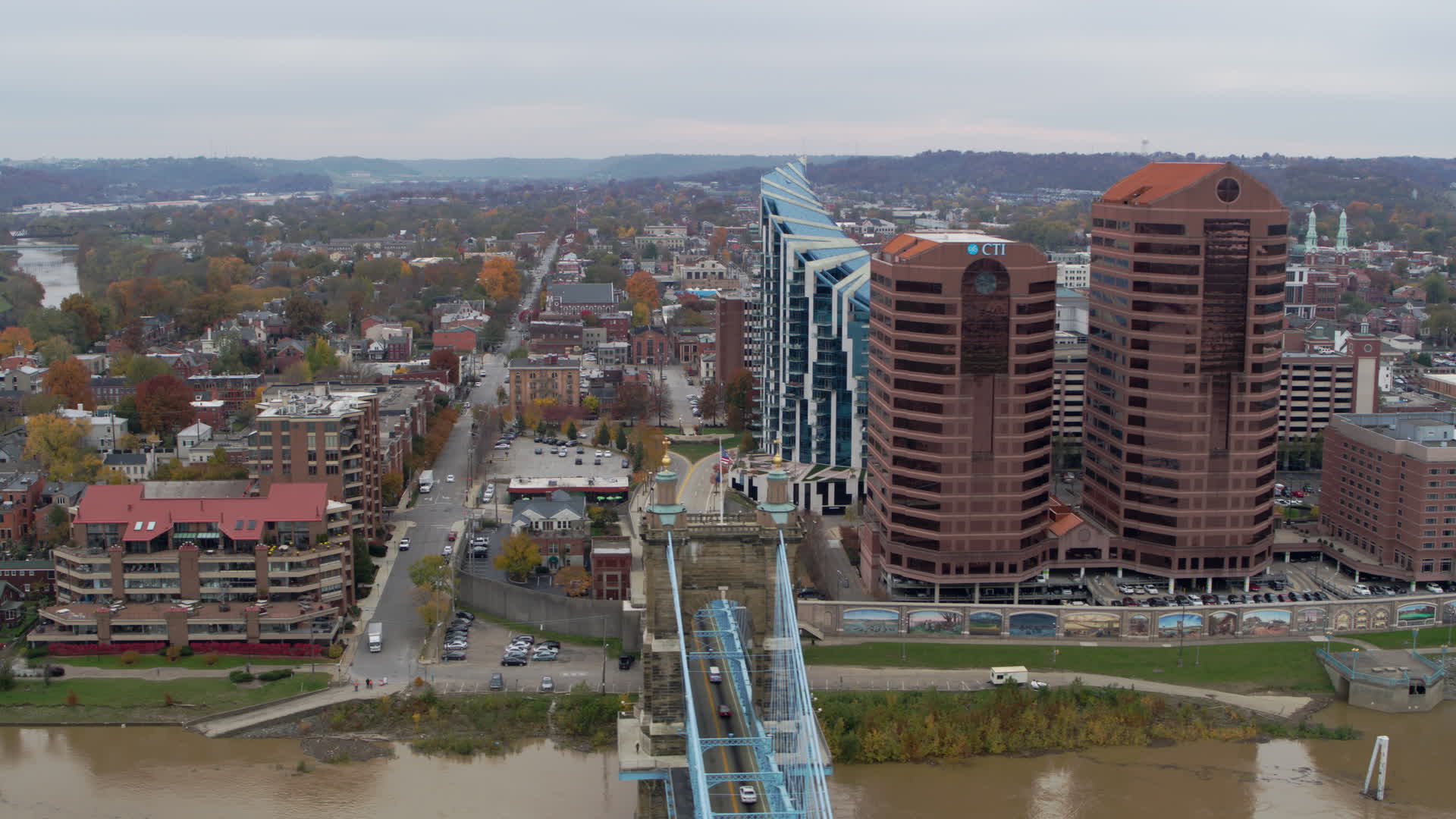 5.7K stock footage aerial video reverse view of city street and condo complex, reveal office