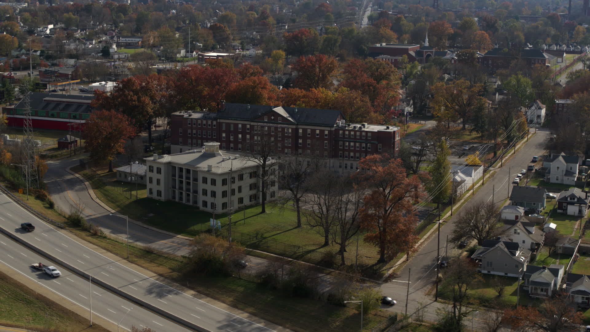 5.7K stock footage aerial video of a health clinic behind historic