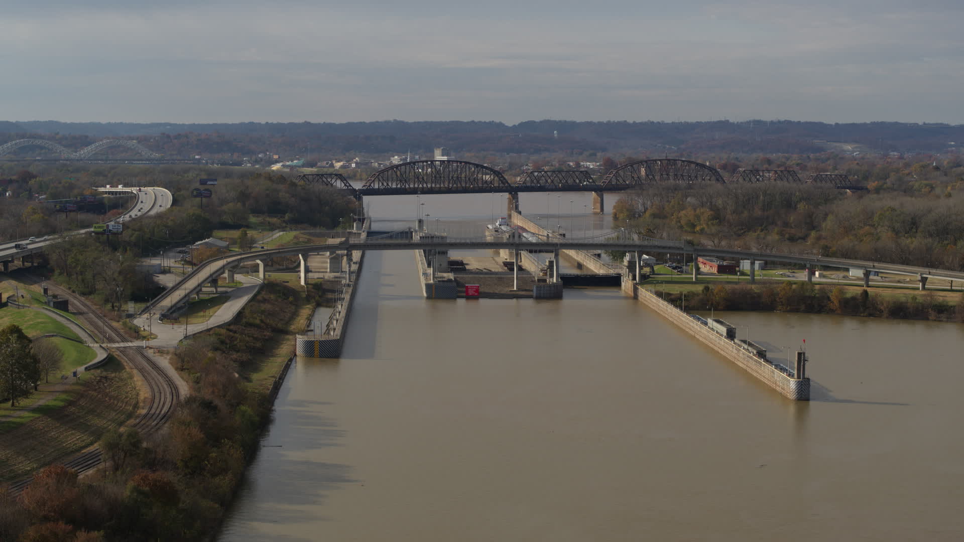 5.7K stock footage aerial video descend near locks and a dam on the