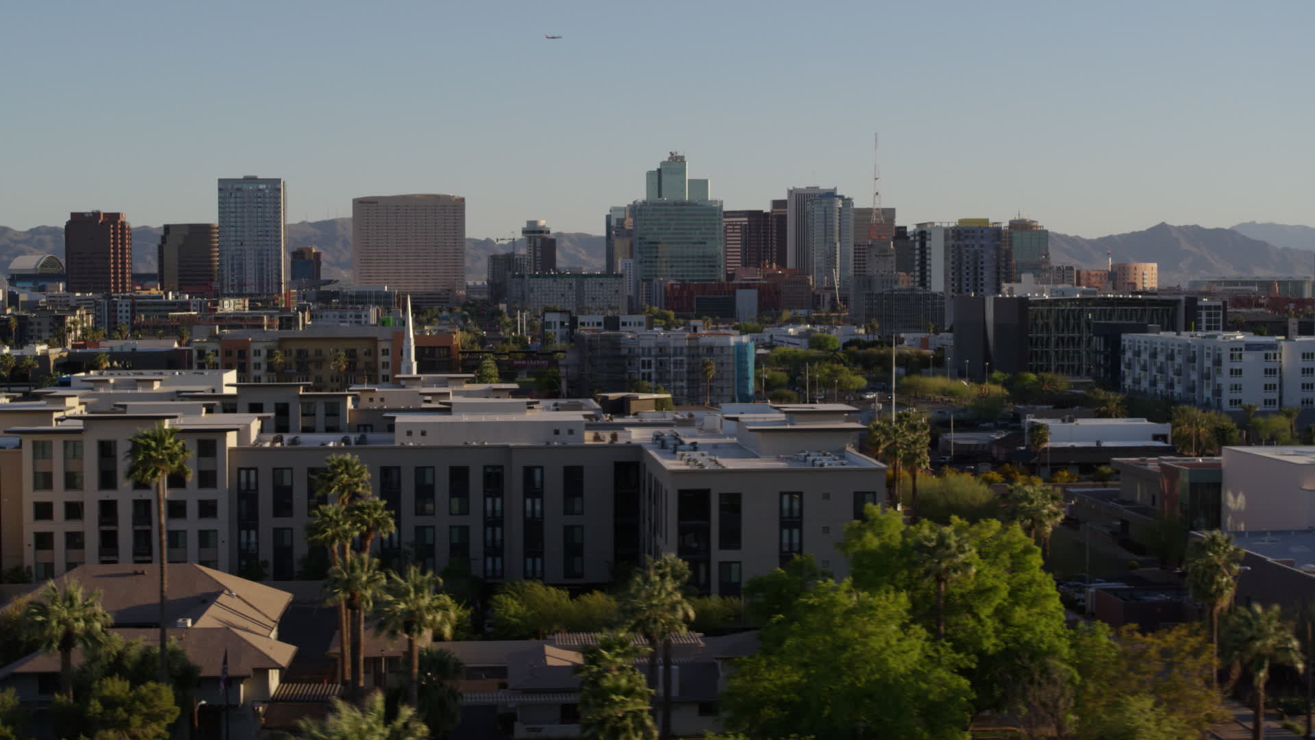 5.7K stock footage aerial video of a view over rooftops at highrise