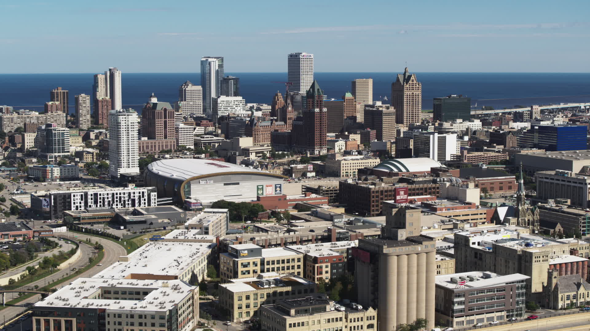 5.7K stock footage aerial video of the city's skyline and arena in