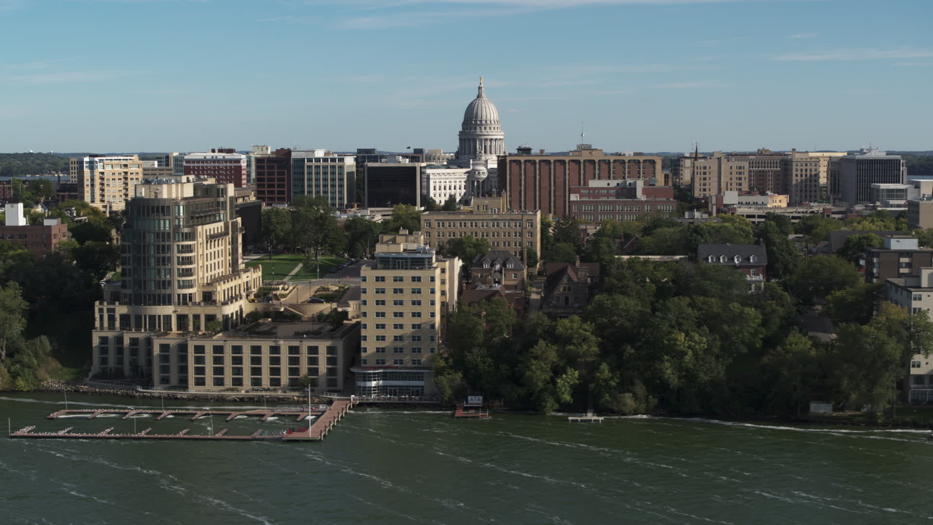 5.7K stock footage aerial video focus on the capitol dome while passing