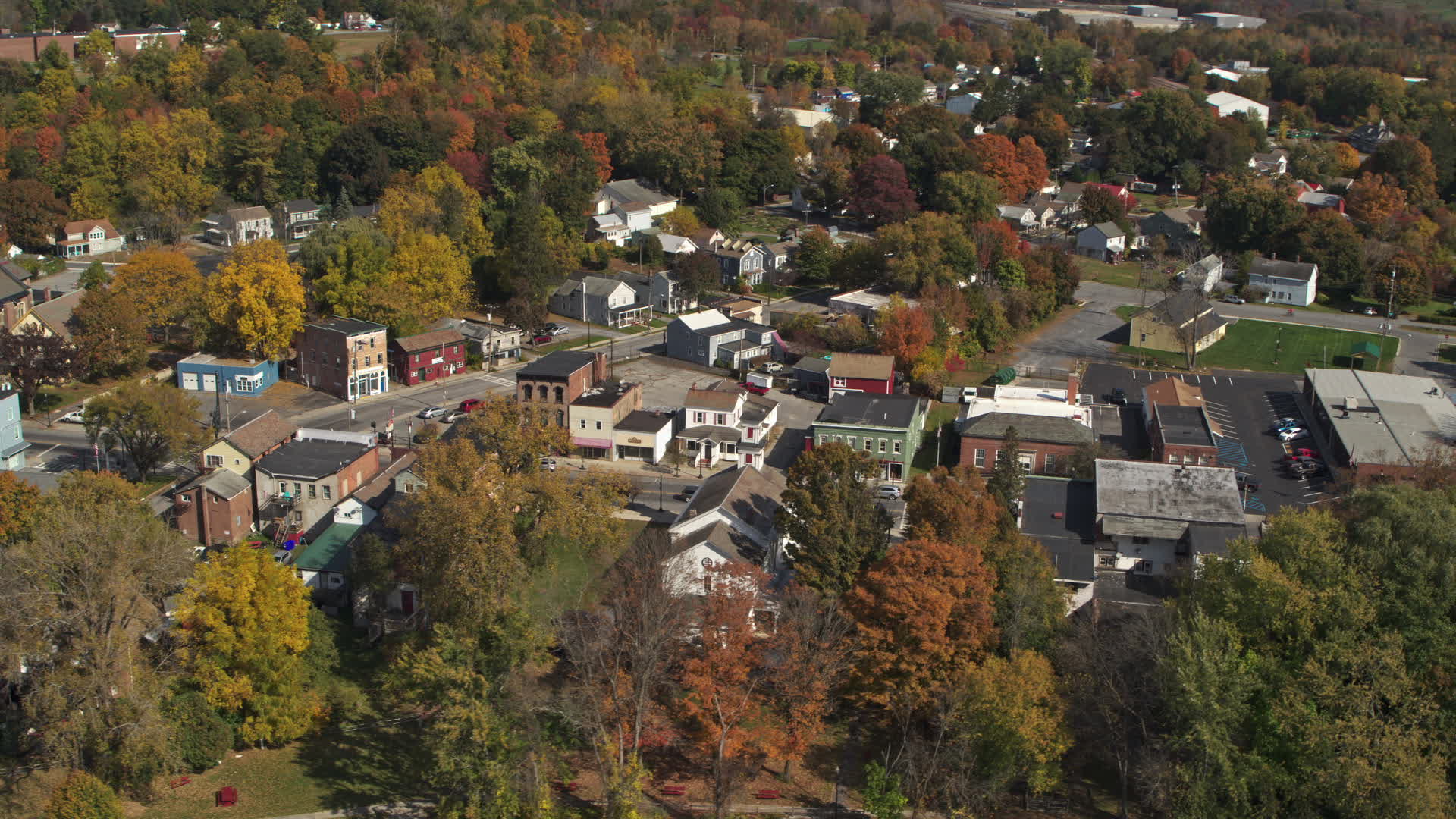 5.7K stock footage aerial video of circling buildings around a small town intersection in Fort