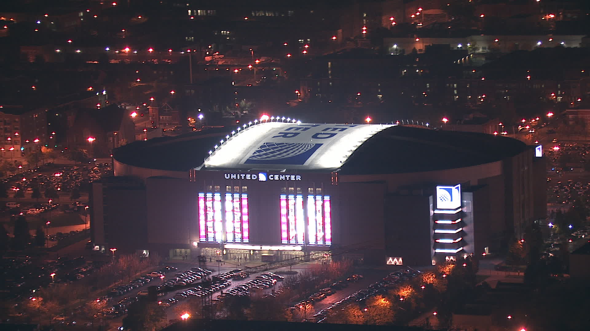 hd-stock-footage-aerial-video-of-united-center-arena-at-night-in-west
