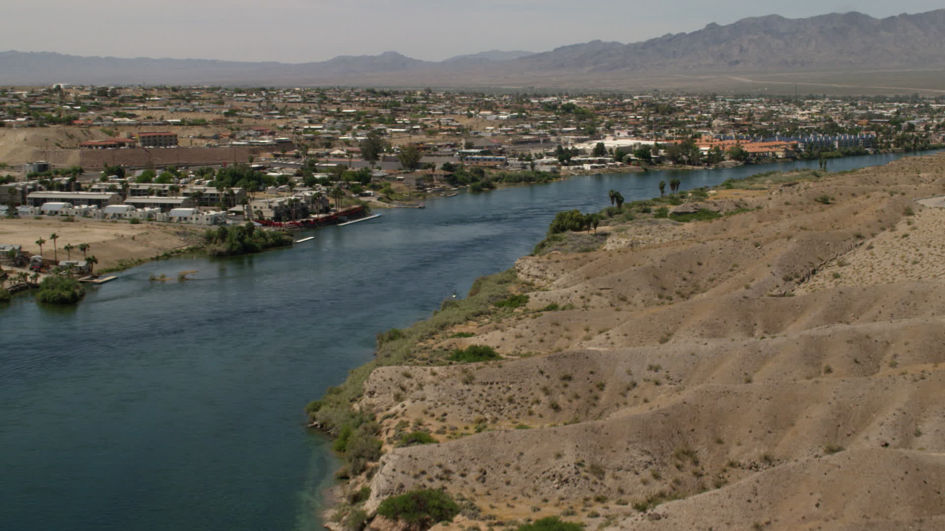 4K stock footage aerial video follow the Colorado River to approach