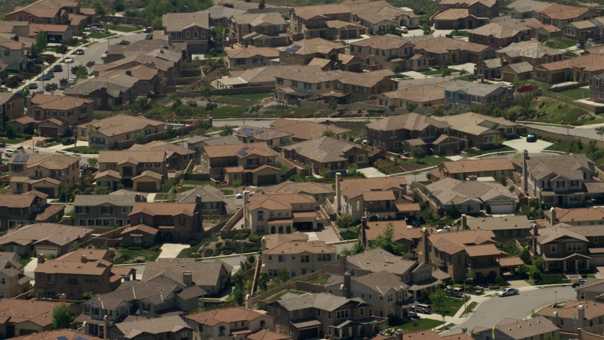 4K stock footage aerial video of a suburban residential neighborhood in