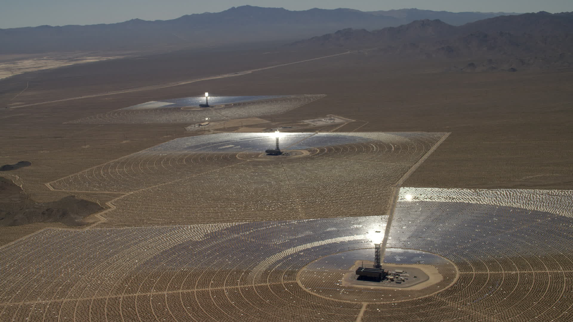 4K stock footage aerial video of a view of the three solar power