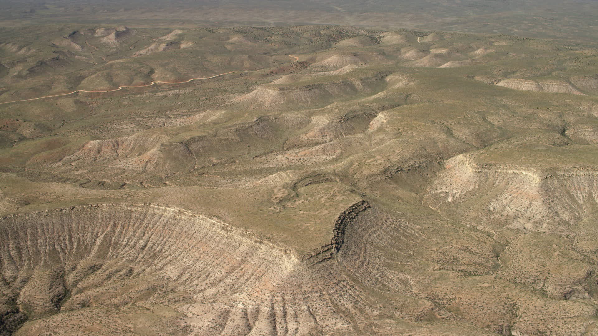4K stock footage aerial video fly over arid mesas in the Arizona Desert
