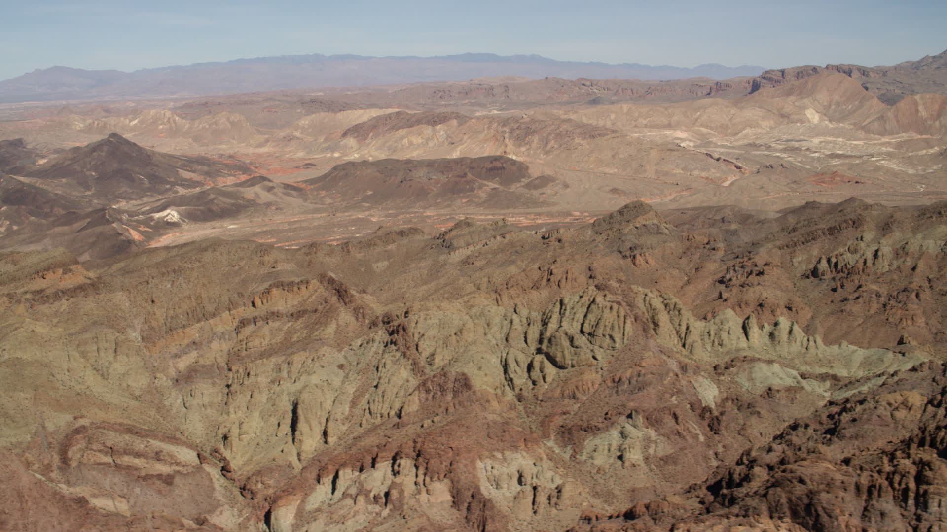 4K stock footage aerial video of rough mountains in a barren Nevada