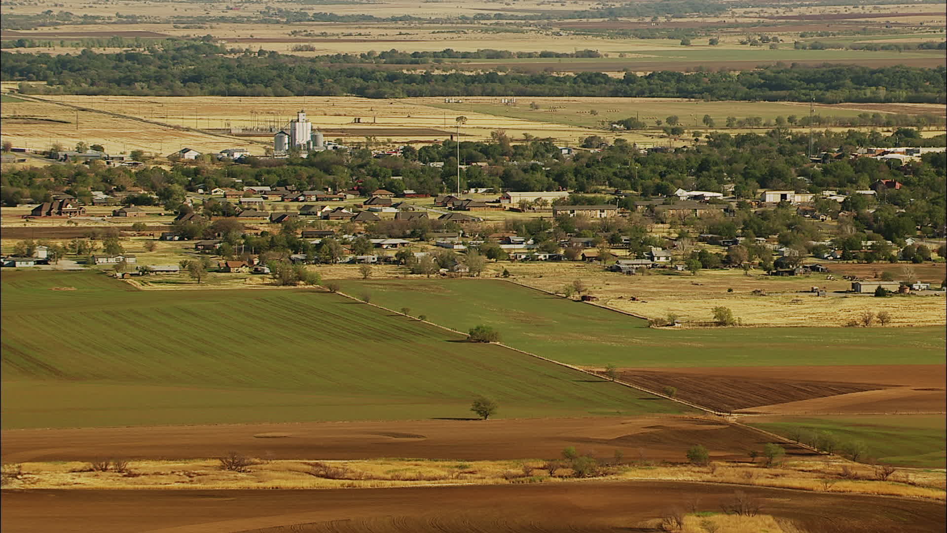 HD stock footage aerial video of the town of Walters and farmland in