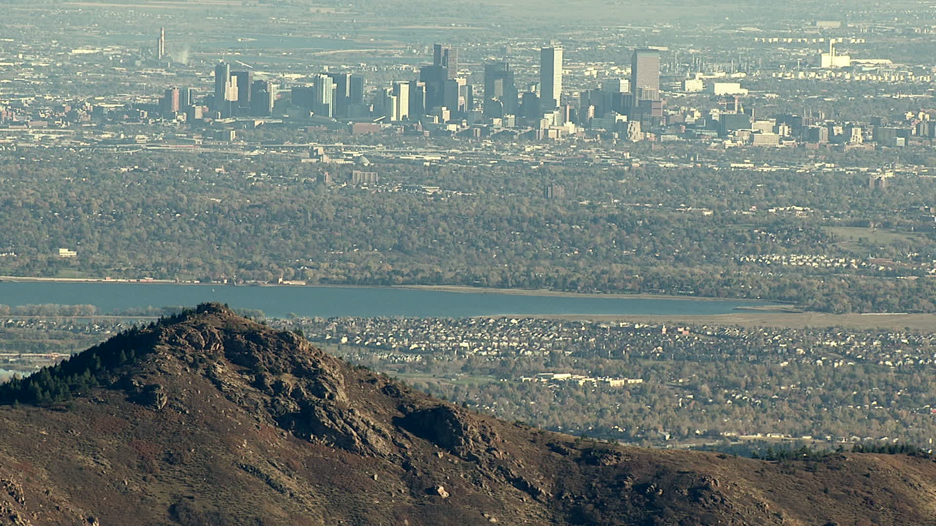HD stock footage aerial video of Downtown Denver and Marston Lake seen