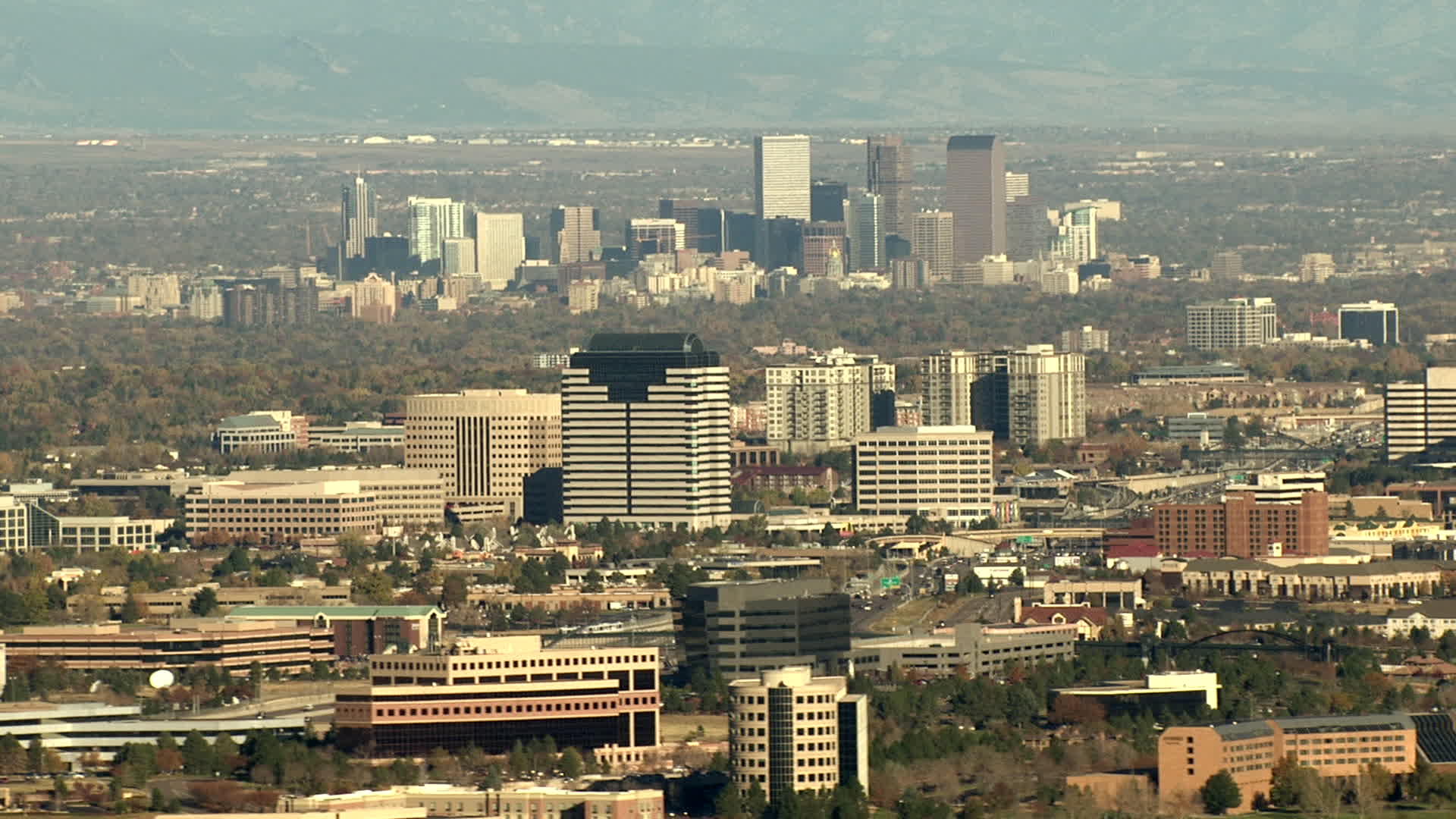 HD stock footage aerial video of Downtown Denver skyline and Centennial