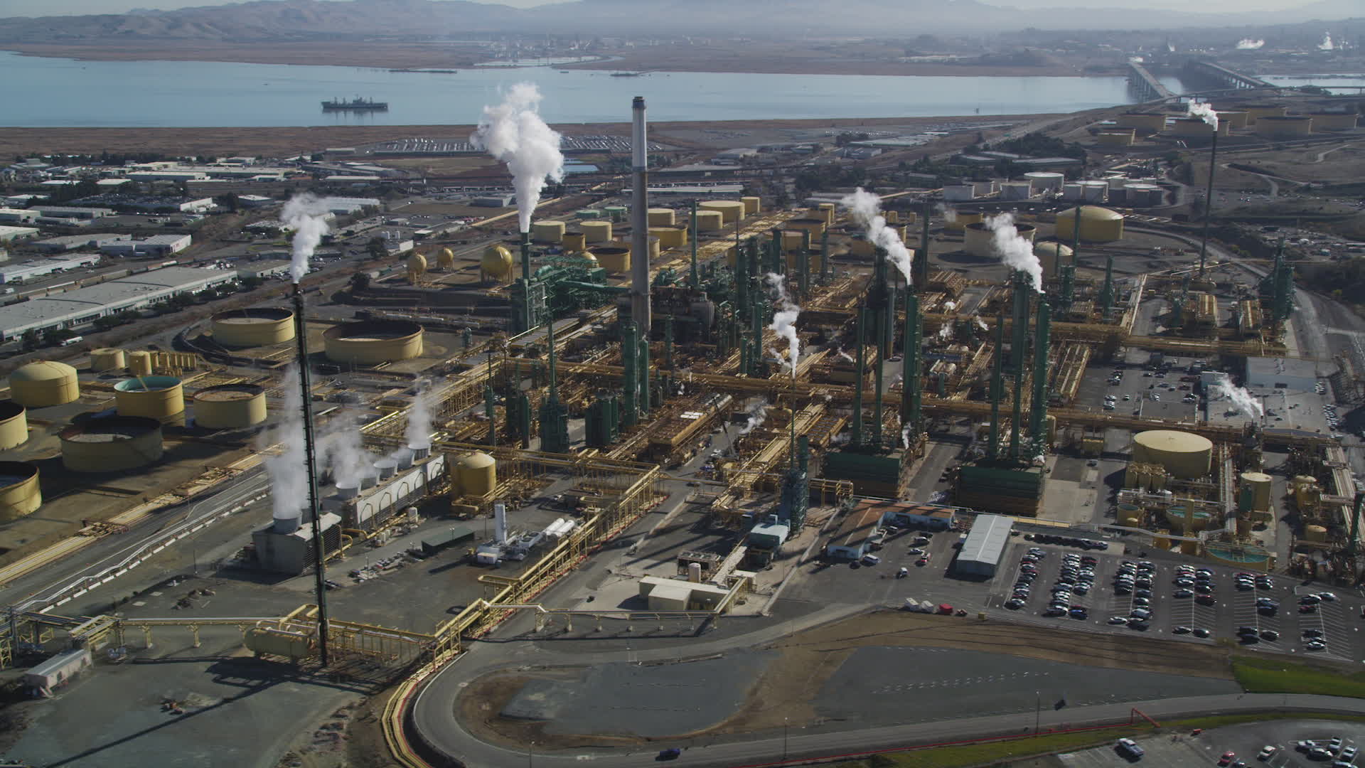 5K stock footage aerial video of passing by the Valero Oil Refinery