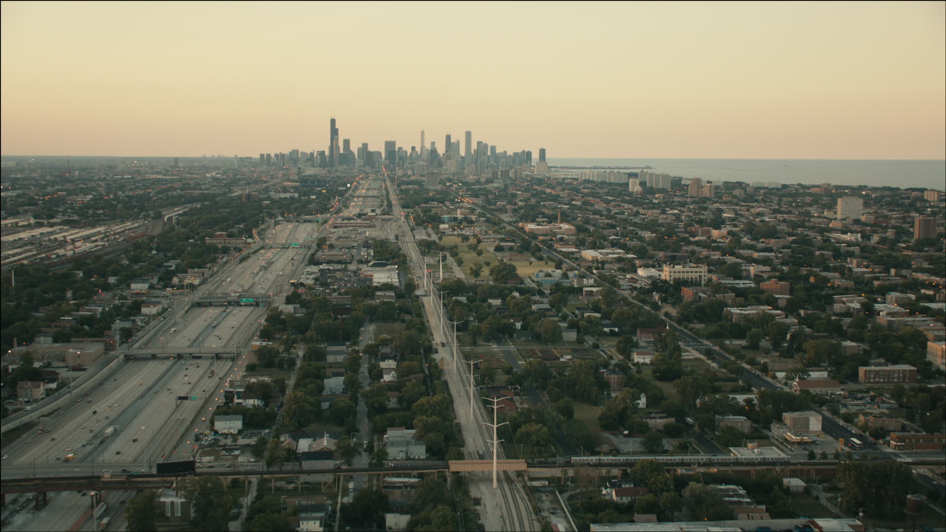 HD stock footage aerial video of the city skyline at sunset seen from
