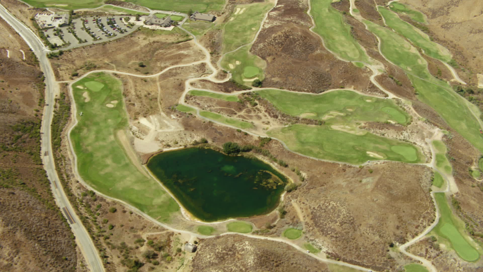 1080 stock footage aerial video of a bird's eye view of golf course in