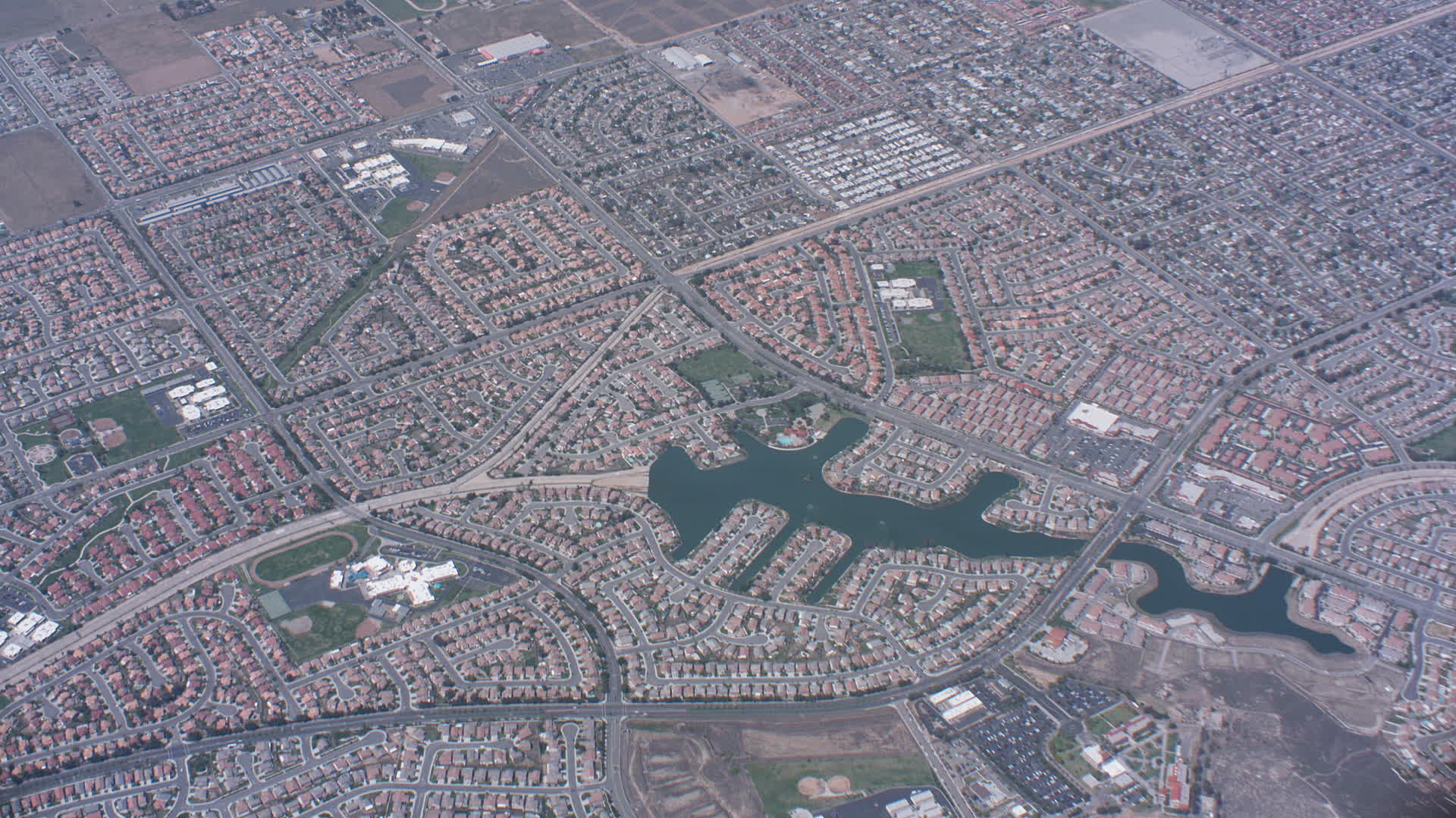 4K stock footage aerial video of a bird's eye view of suburban