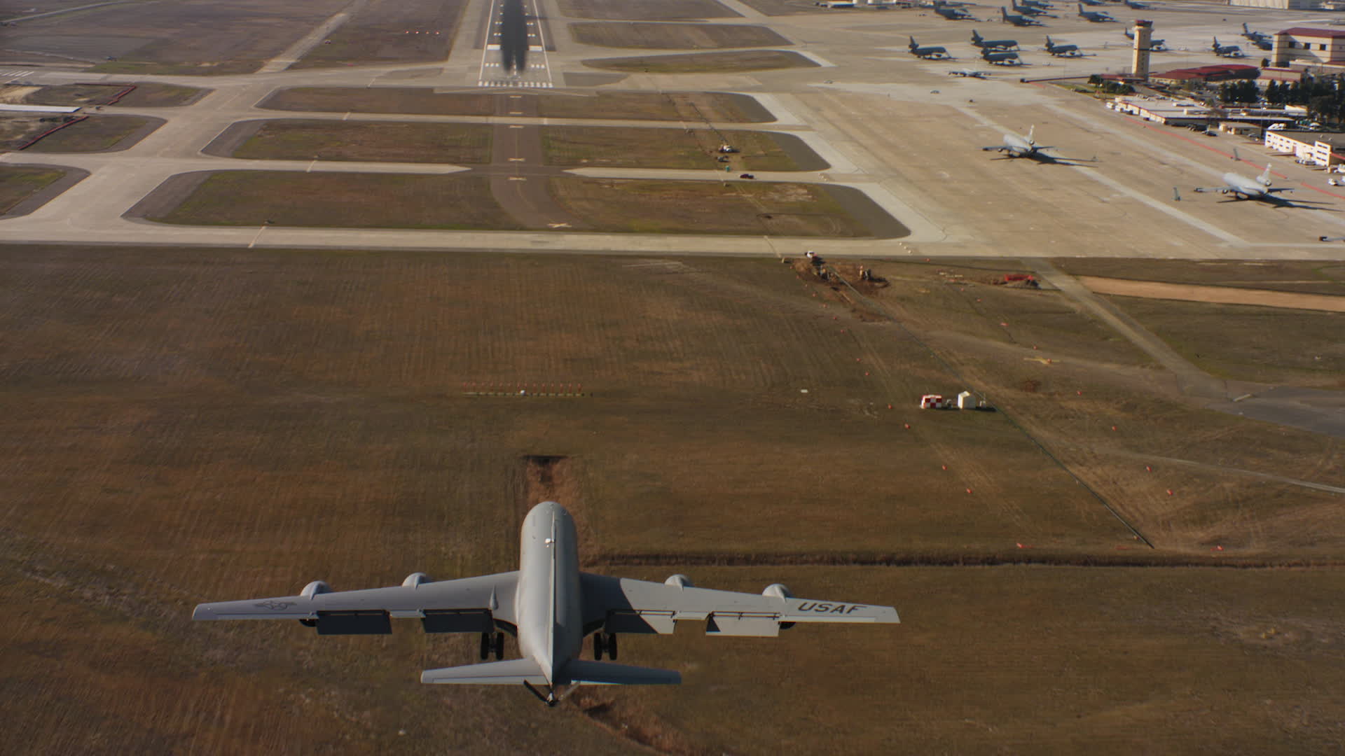 4K stock footage aerial video of a Boeing KC135 landing at Travis Air