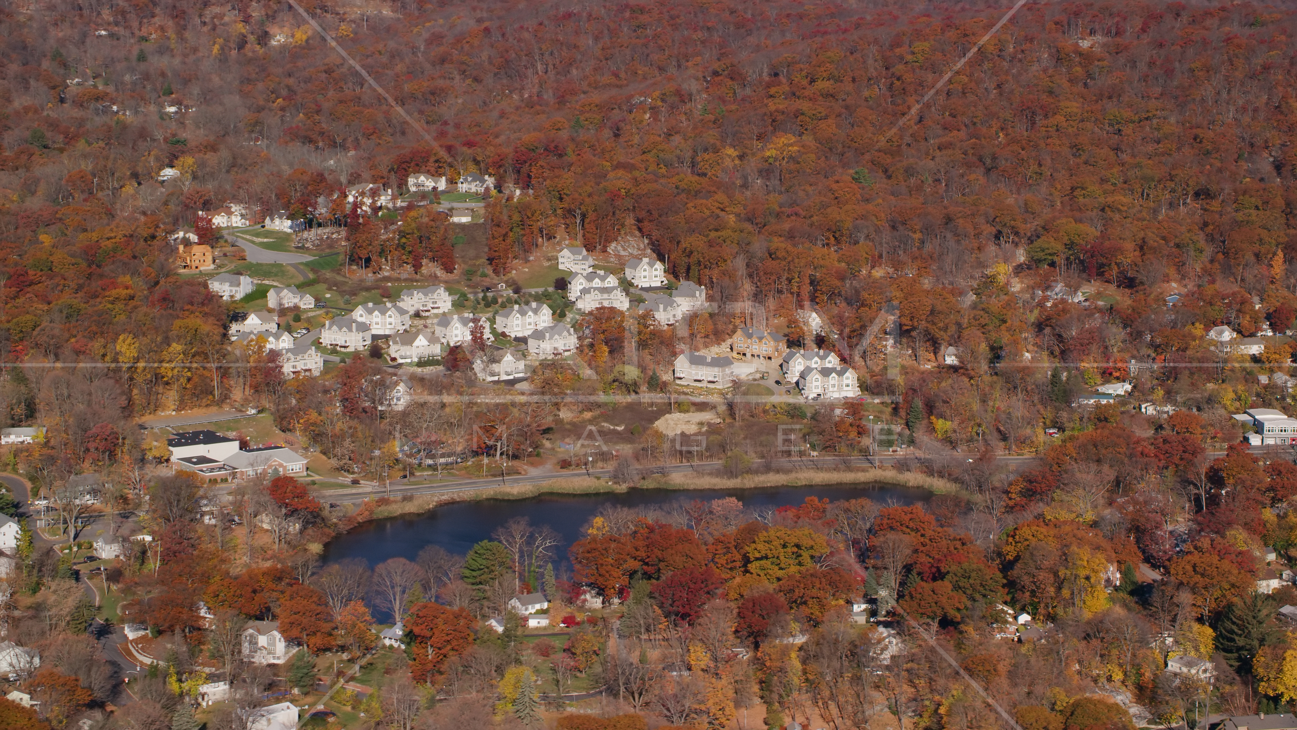 Condominium complexes overlooking Garrison Pond in Autumn, Fort