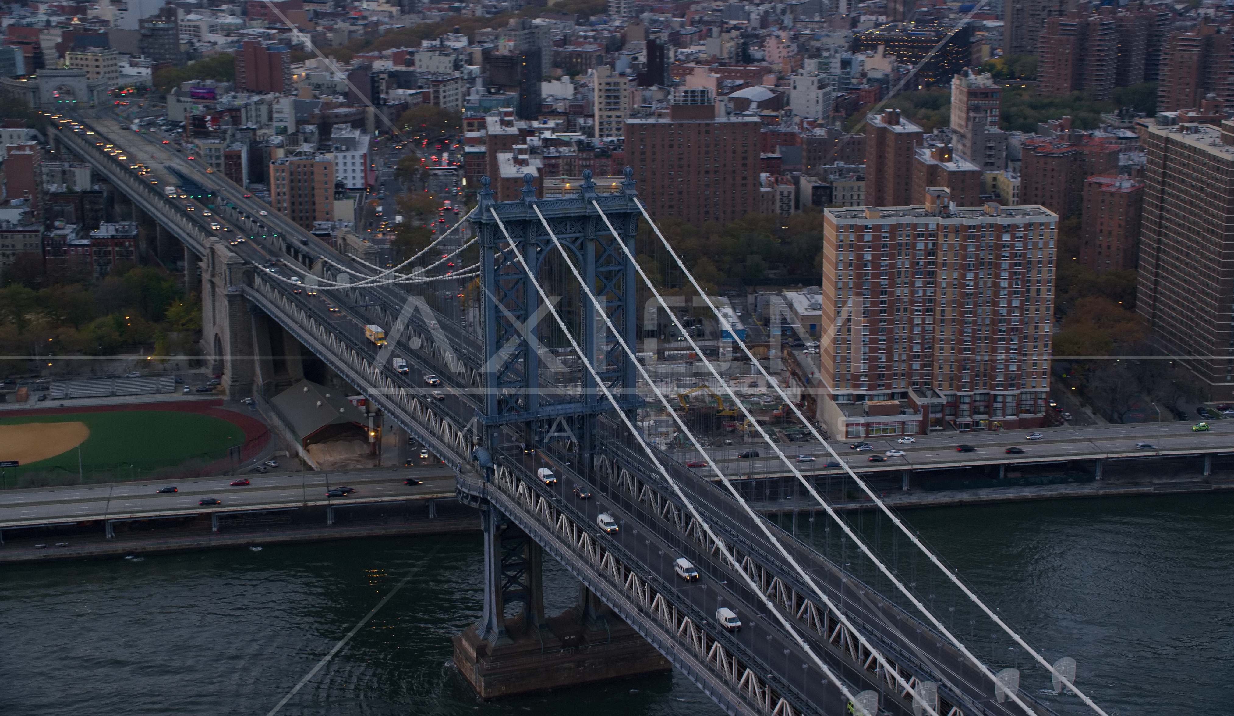 The Manhattan Bridge at sunset in New York City Aerial Stock Photo